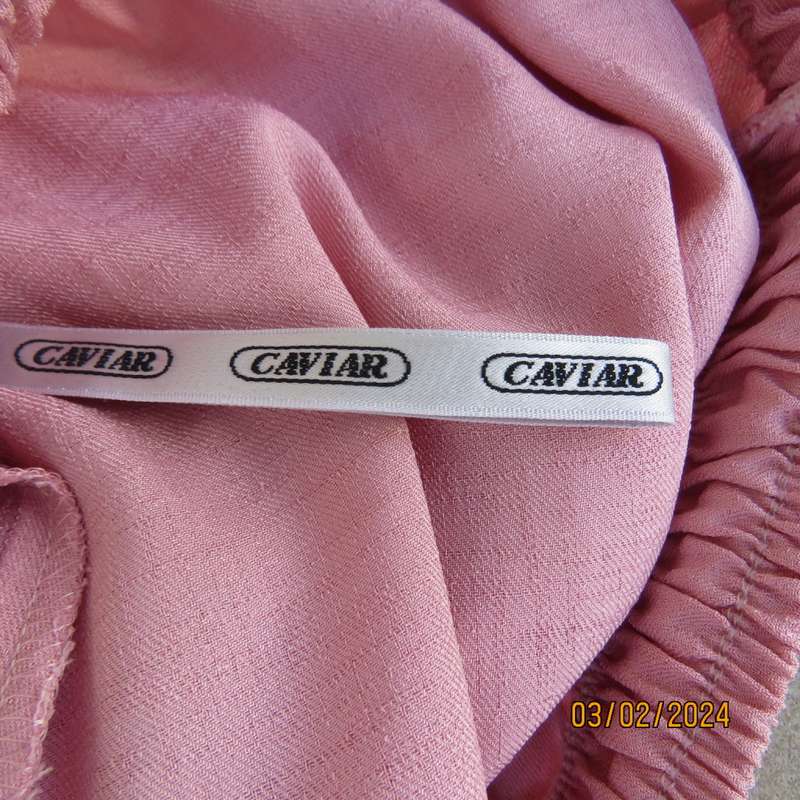 Up the luxe with this 3 pc rose pink ensemble by CAVIAR size 40. Comfy pants, sleeveless top, jacket