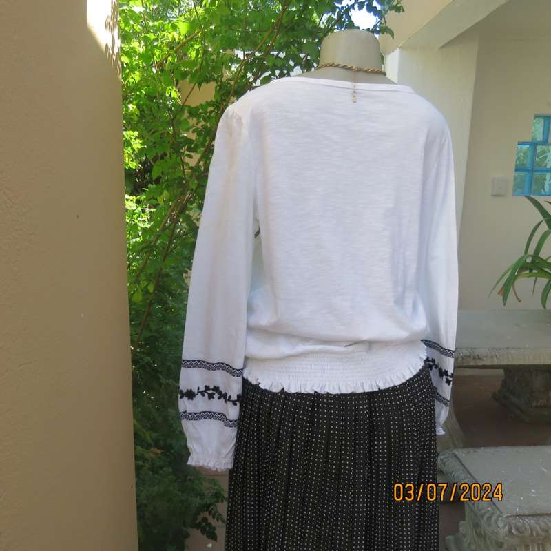 Tasteful black floral embroidered white cotton long sleeve top size 36 by EDITION. As new condition.