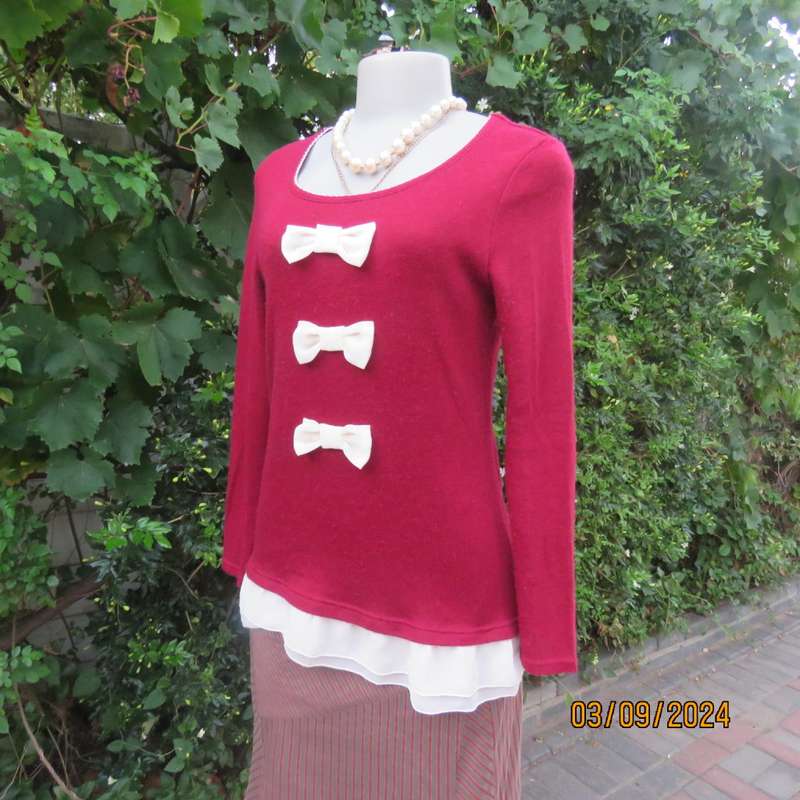 Soft dark red long sleeve angora/acrylic stretch knitted top. Cream fabric bows & frill. Size 34/10
