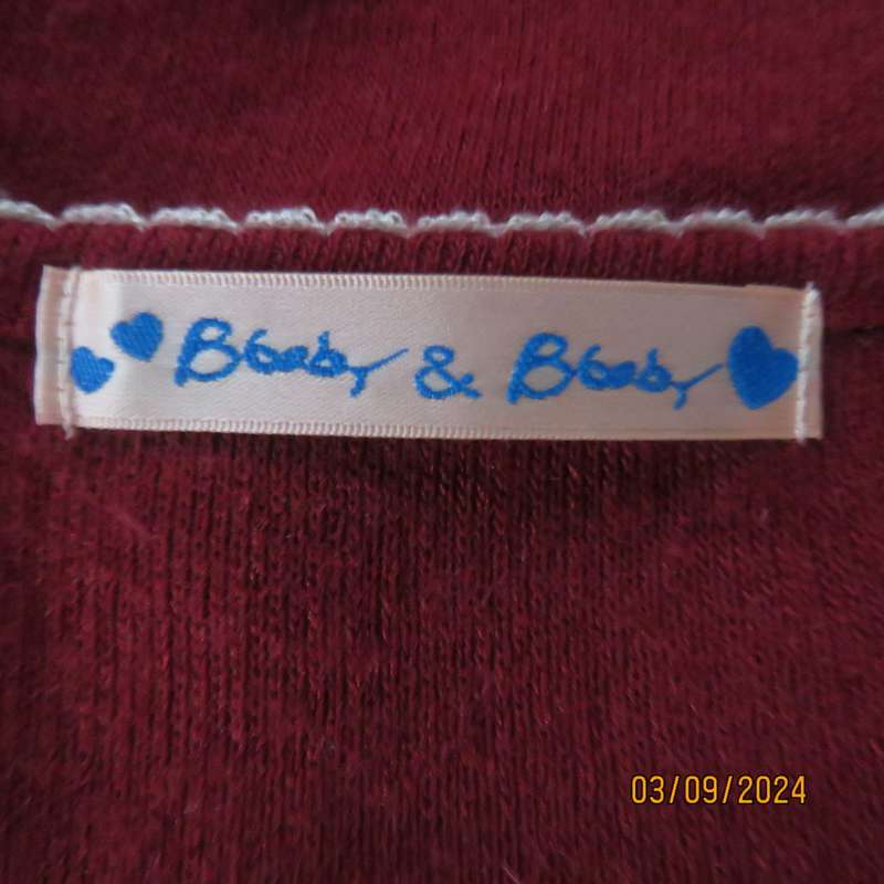 Soft dark red long sleeve angora/acrylic stretch knitted top. Cream fabric bows & frill. Size 34/10
