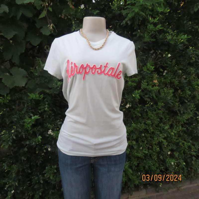 AEROPOSTALE best brand soft green capped sleeve T Shirt size 34. Name stitched on front.
