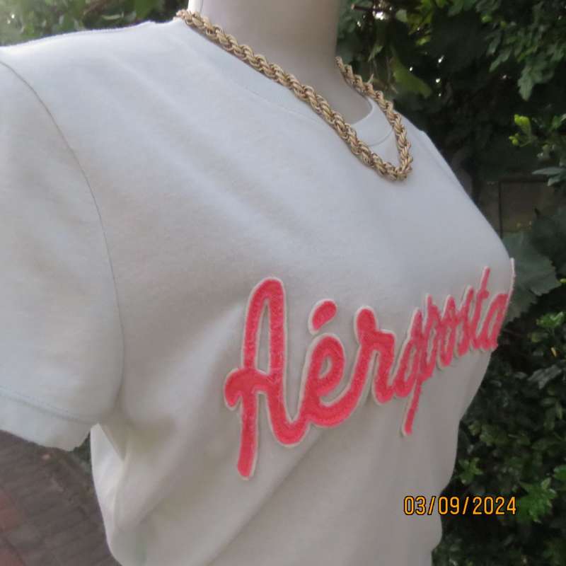 AEROPOSTALE best brand soft green capped sleeve T Shirt size 34. Name stitched on front.