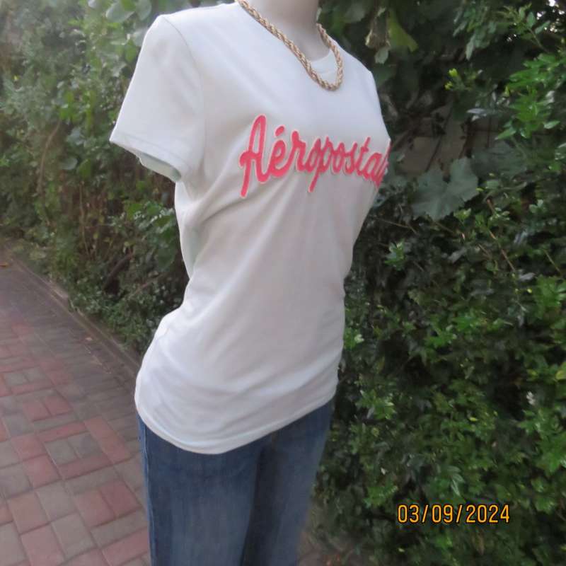 AEROPOSTALE best brand soft green capped sleeve T Shirt size 34. Name stitched on front.