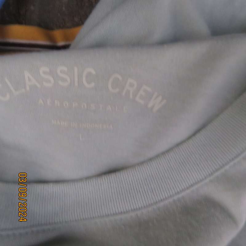 AEROPOSTALE best brand soft green capped sleeve T Shirt size 34. Name stitched on front.