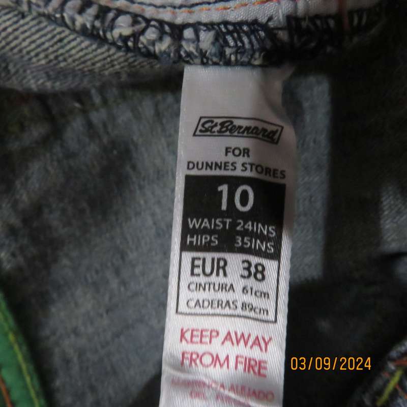 Pair of blue denim cotton Slouch fit low rise jeans by ST BERNARD size 34.Bootlegged. Very good cond