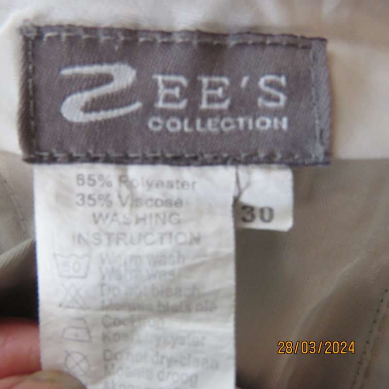 Very smart beige men`s pants with pleated front. Size 30 by ZEE`S Collection. New cond.