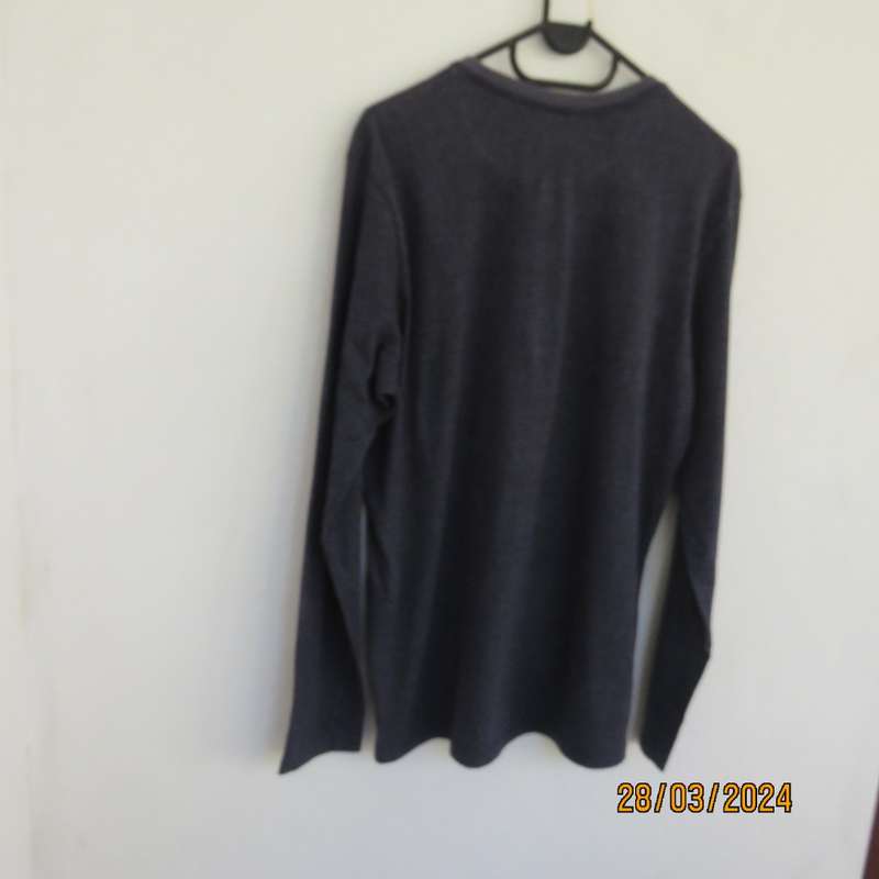 WOOLWORTHS warm dark denim blue long sleeve men`s top size Med. 3 button opening. As new.