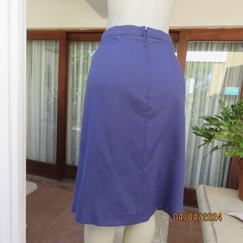 Smart indigo blue 2 pc pencil skirt-open hanging short sleeve jacket. Boutique made size 40.As new