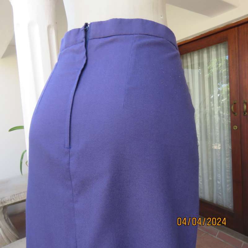 Smart indigo blue 2 pc pencil skirt-open hanging short sleeve jacket. Boutique made size 40.As new