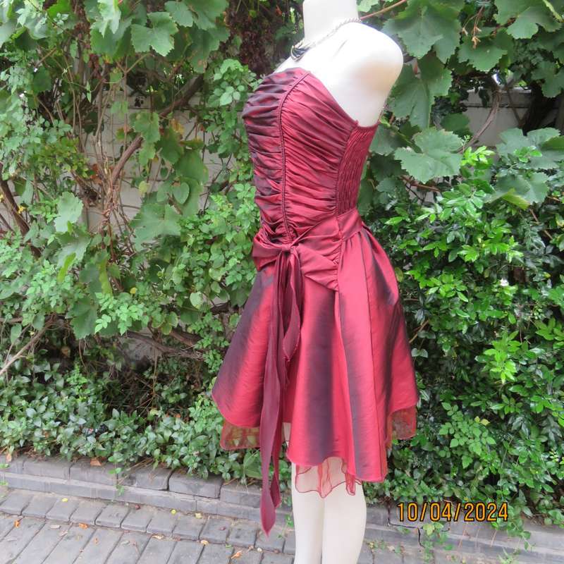 Chic garnet red polyester satin dress. Ruched top front. Skater skirt. Size 36.
