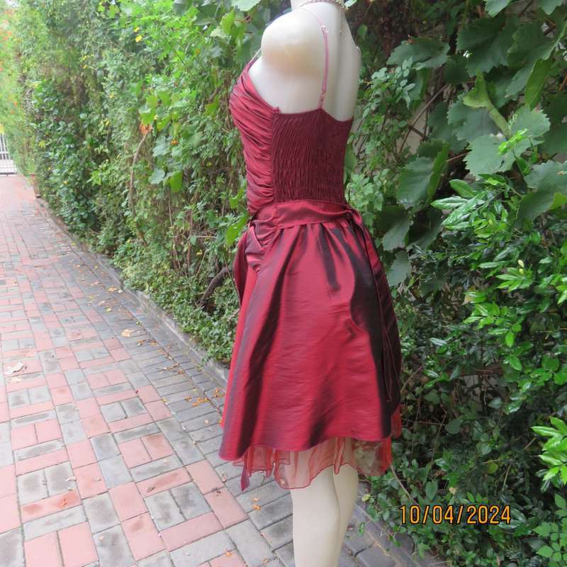 Chic garnet red polyester satin dress. Ruched top front. Skater skirt. Size 36.