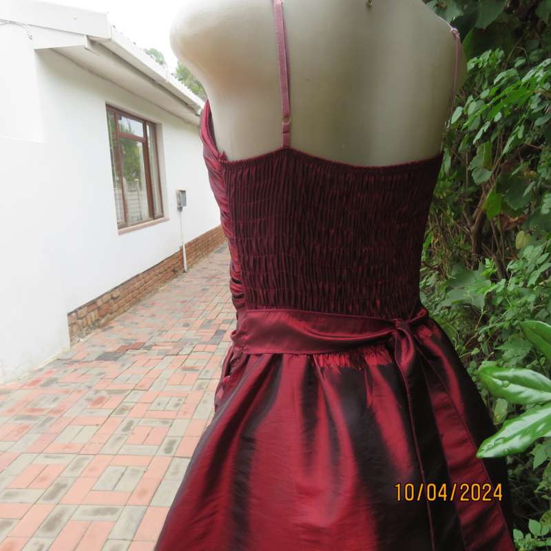 Chic garnet red polyester satin dress. Ruched top front. Skater skirt. Size 36.
