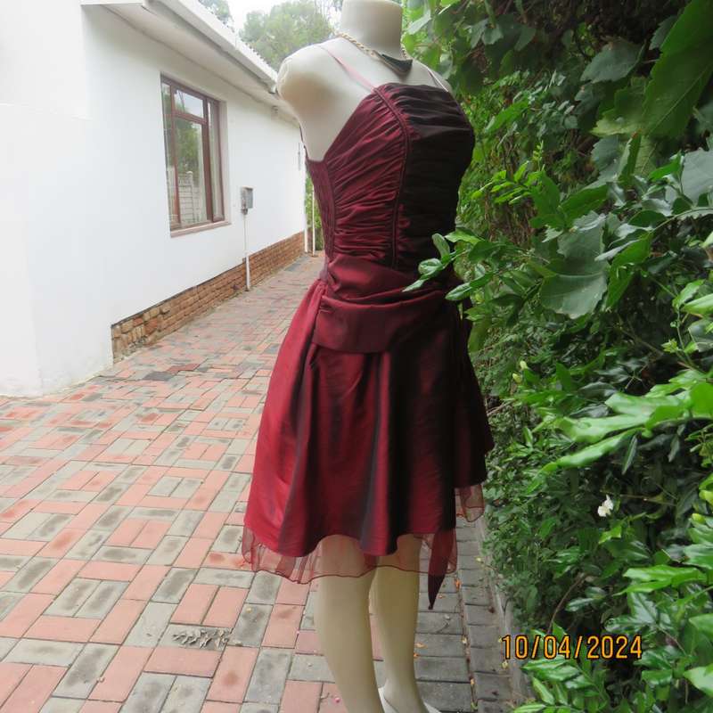 Chic garnet red polyester satin dress. Ruched top front. Skater skirt. Size 36.
