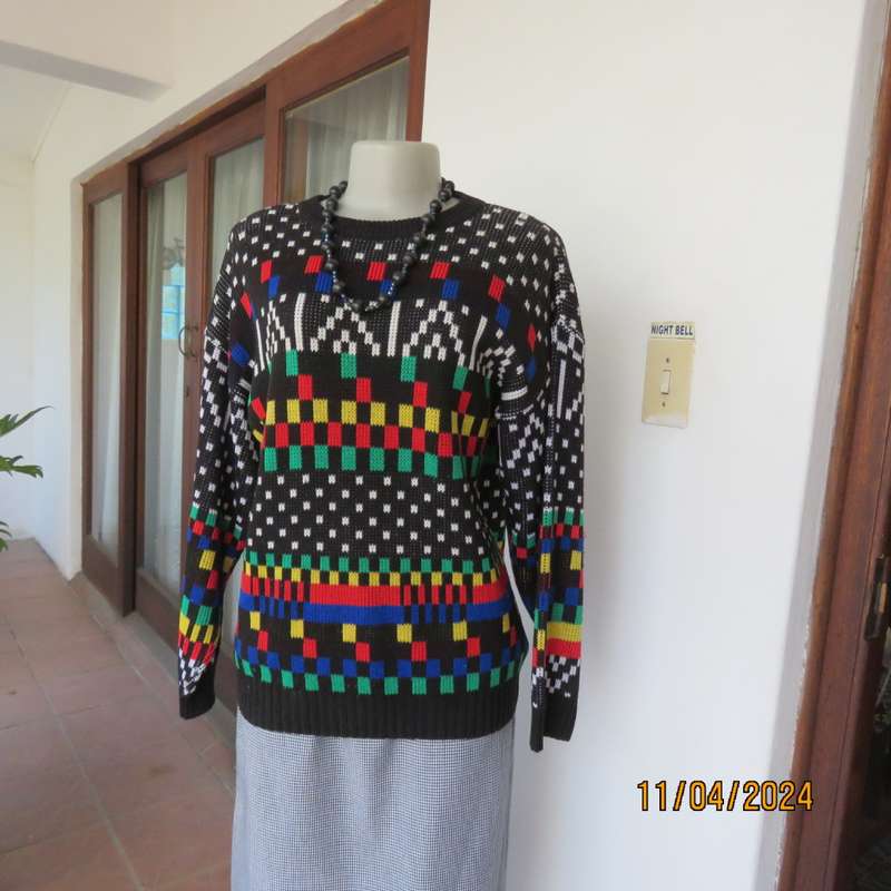 High quality black fair isle long sleeve jersey.Various bright colours. By CLICHE size 38 to 40.