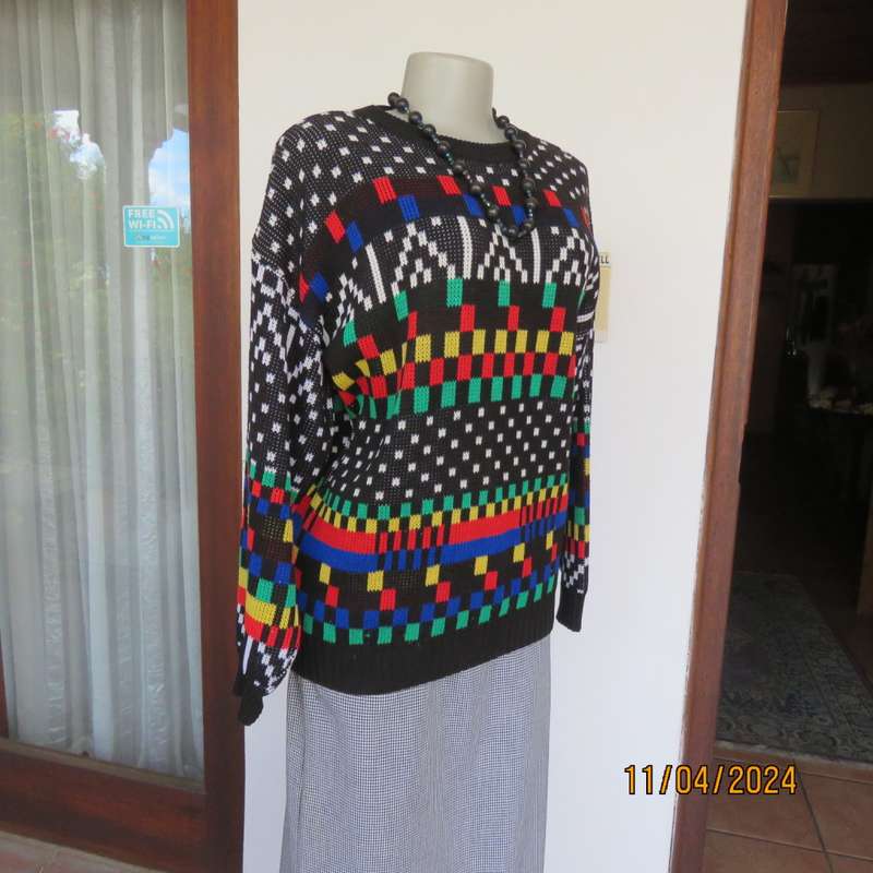 High quality black fair isle long sleeve jersey.Various bright colours. By CLICHE size 38 to 40.