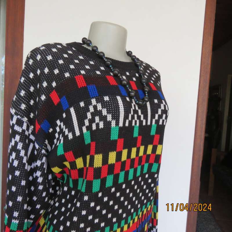 High quality black fair isle long sleeve jersey.Various bright colours. By CLICHE size 38 to 40.