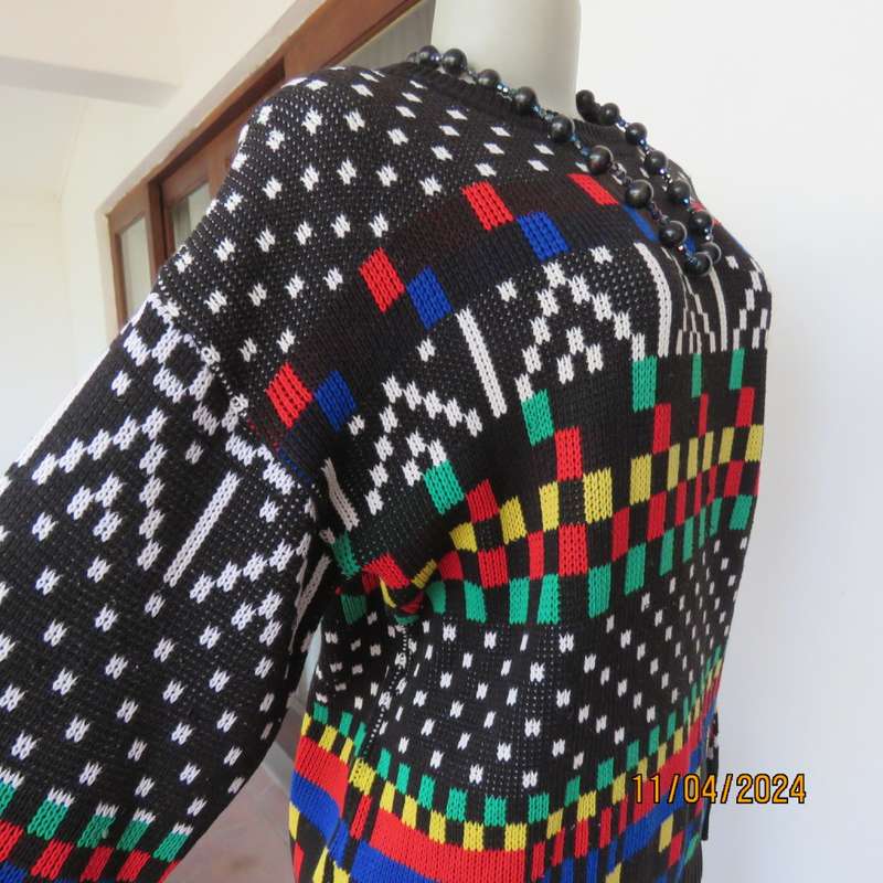 High quality black fair isle long sleeve jersey.Various bright colours. By CLICHE size 38 to 40.