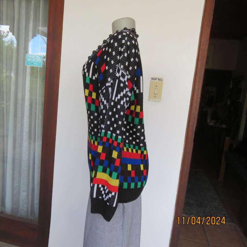 High quality black fair isle long sleeve jersey.Various bright colours. By CLICHE size 38 to 40.