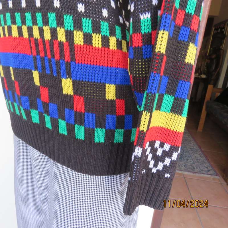 High quality black fair isle long sleeve jersey.Various bright colours. By CLICHE size 38 to 40.