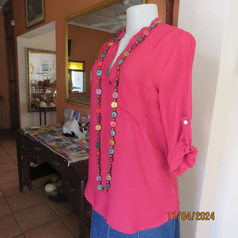 Scarlet red slip over sheer polyester top. Banded collar with V slit. Size 36/12, One pocket. Yoke