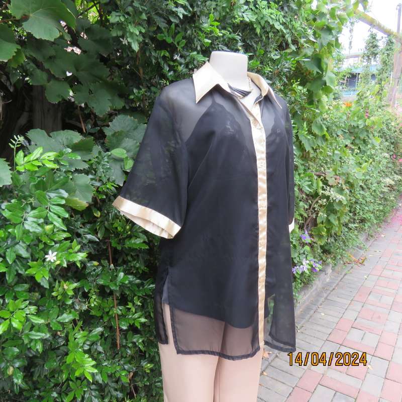 Up the luxe with this sheer black/gold satin button down top/gold shirt collar. Size 42. New cond.