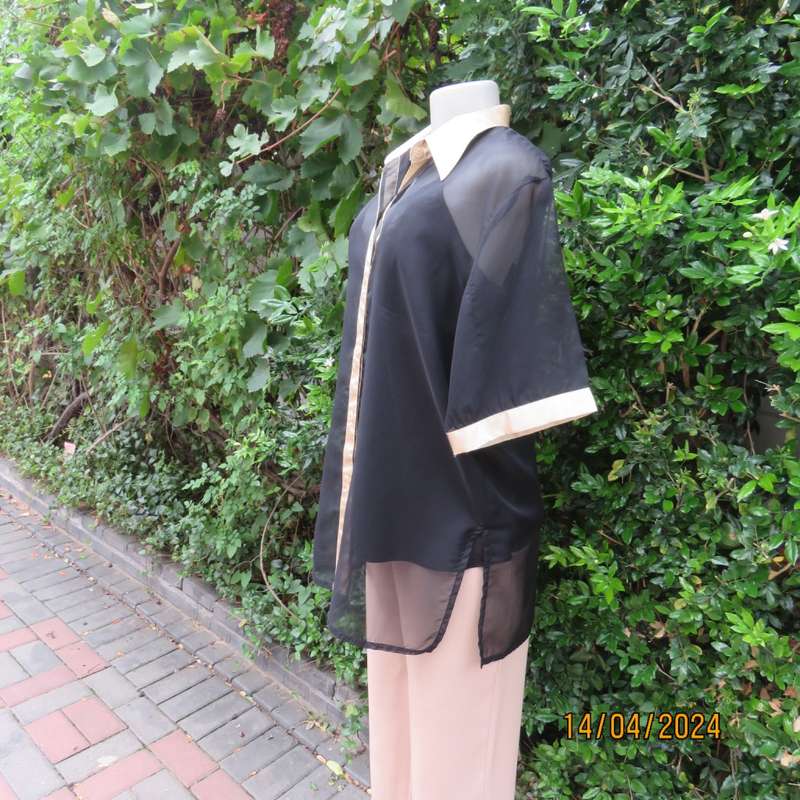 Up the luxe with this sheer black/gold satin button down top/gold shirt collar. Size 42. New cond.