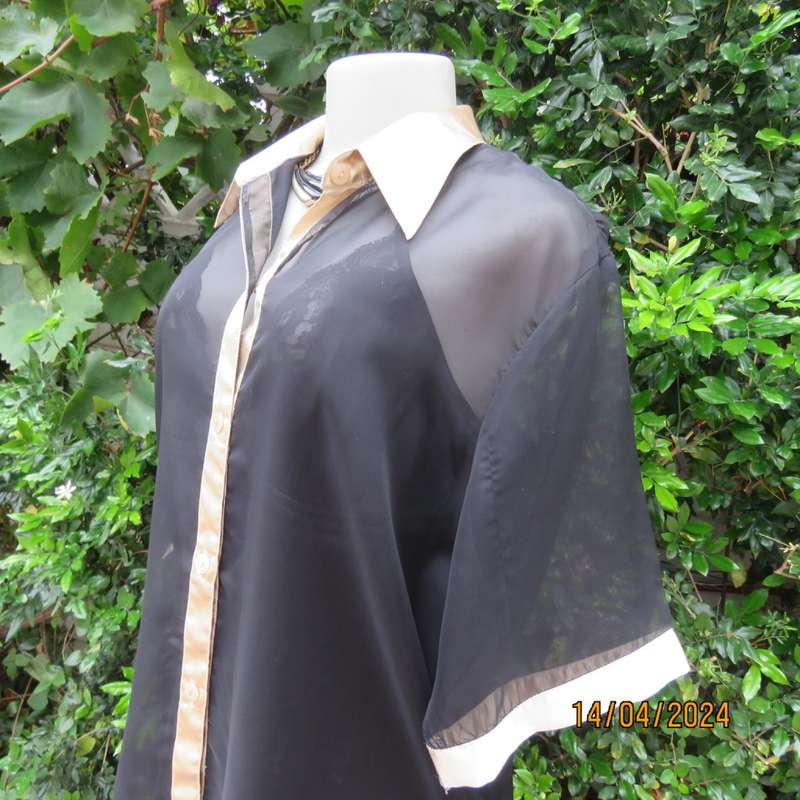 Up the luxe with this sheer black/gold satin button down top/gold shirt collar. Size 42. New cond.
