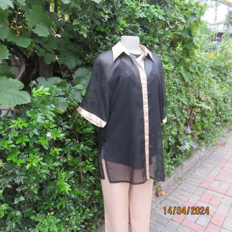 Up the luxe with this sheer black/gold satin button down top/gold shirt collar. Size 42. New cond.