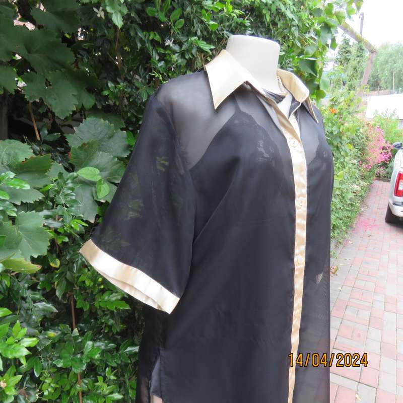 Up the luxe with this sheer black/gold satin button down top/gold shirt collar. Size 42. New cond.