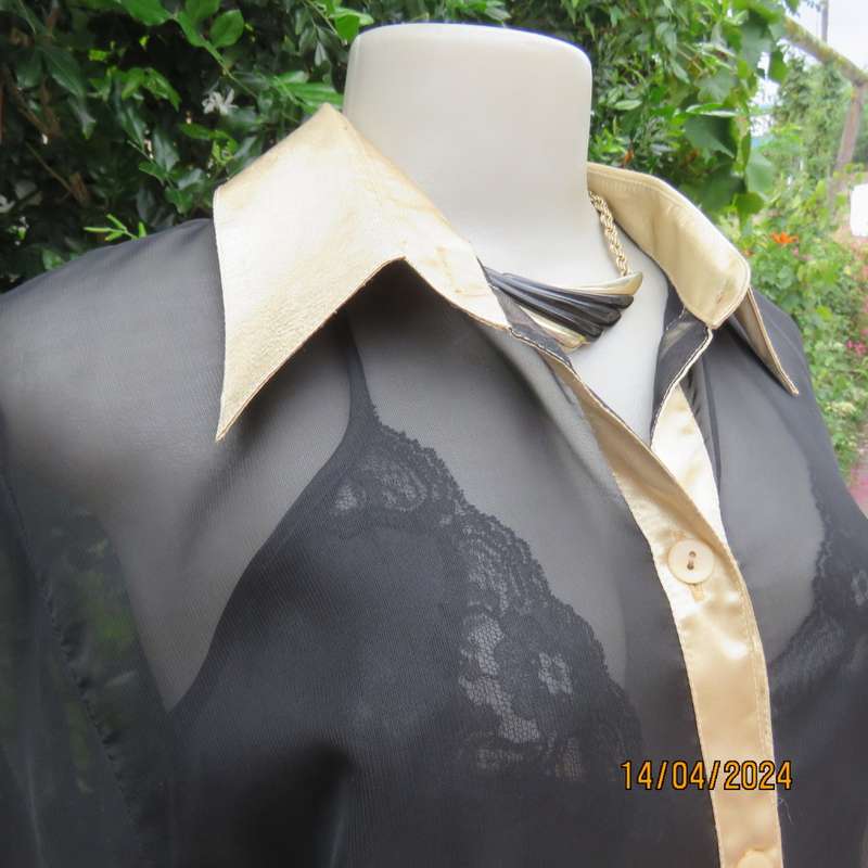 Up the luxe with this sheer black/gold satin button down top/gold shirt collar. Size 42. New cond.