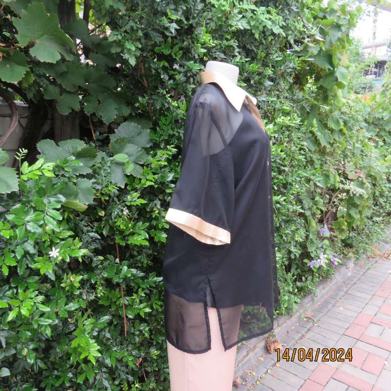 Up the luxe with this sheer black/gold satin button down top/gold shirt collar. Size 42. New cond.