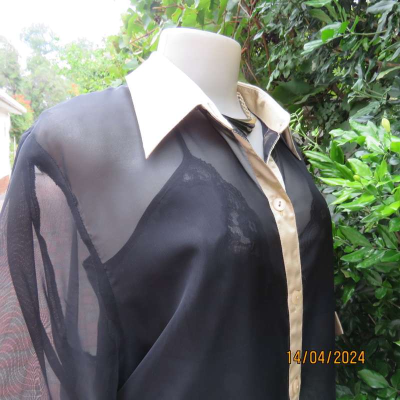 Up the luxe with this sheer black/gold satin button down top/gold shirt collar. Size 42. New cond.