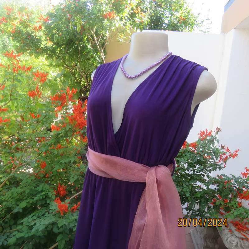 Smart casual purple stretch polyester calf length dress. Low V cross over top. Size 38. As new cond.