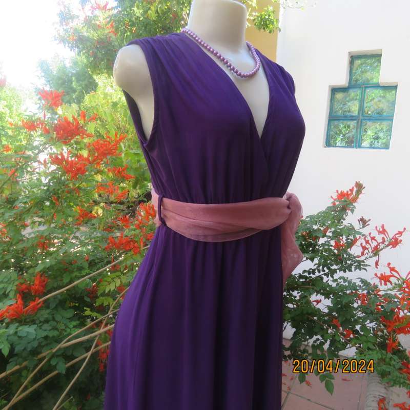 Smart casual purple stretch polyester calf length dress. Low V cross over top. Size 38. As new cond.