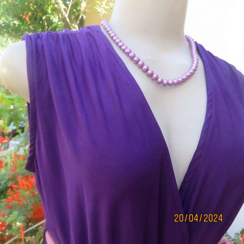 Smart casual purple stretch polyester calf length dress. Low V cross over top. Size 38. As new cond.