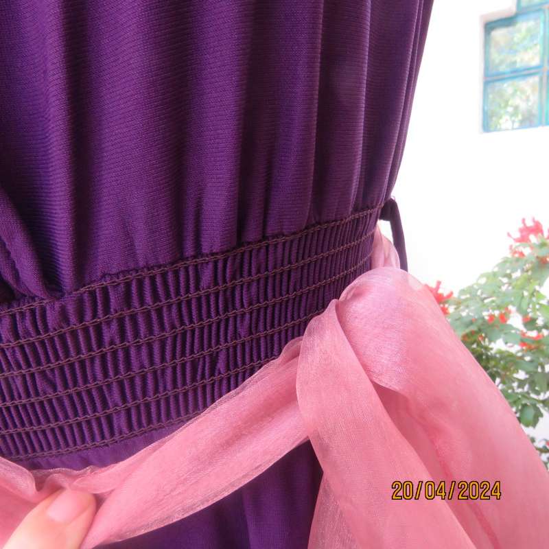 Smart casual purple stretch polyester calf length dress. Low V cross over top. Size 38. As new cond.