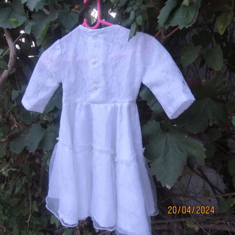 Lovely little white satin/lace dress for baby girl 12 mth old. 2 Layer skirt. Back closure. New cond