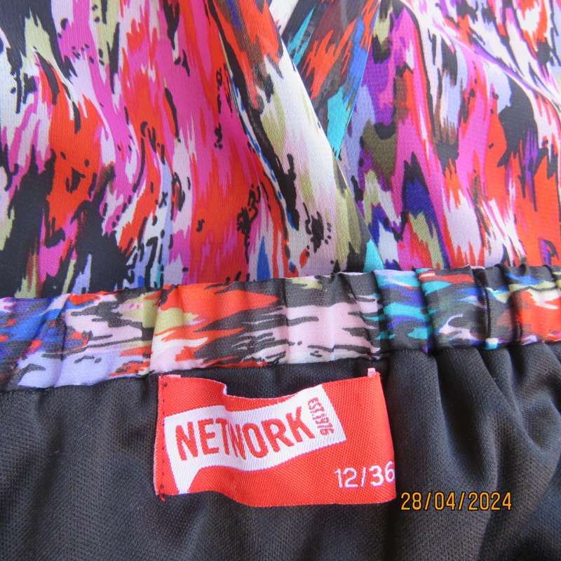 Cheerful sheer polyester gathered skirt/elastic waist. Array of colours. Size 36.Asymmetrical waist