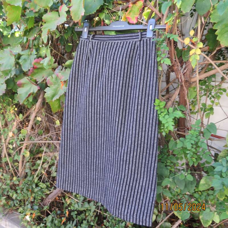 Warm woolen black/white vertical stripe pencil skirt size 30 by ESSENCE. Pleat/zip at back.As new