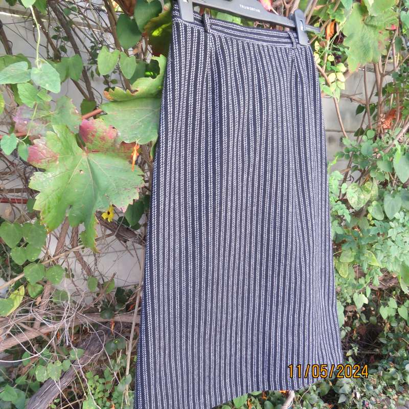 Warm woolen black/white vertical stripe pencil skirt size 30 by ESSENCE. Pleat/zip at back.As new