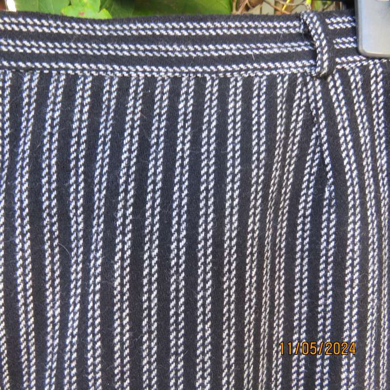 Warm woolen black/white vertical stripe pencil skirt size 30 by ESSENCE. Pleat/zip at back.As new