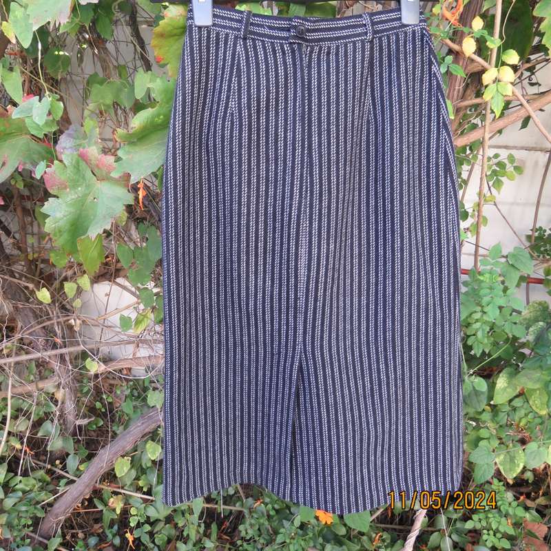 Warm woolen black/white vertical stripe pencil skirt size 30 by ESSENCE. Pleat/zip at back.As new