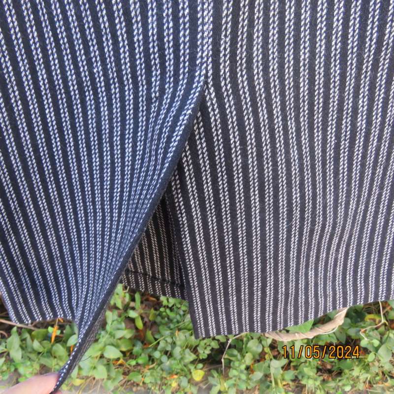 Warm woolen black/white vertical stripe pencil skirt size 30 by ESSENCE. Pleat/zip at back.As new