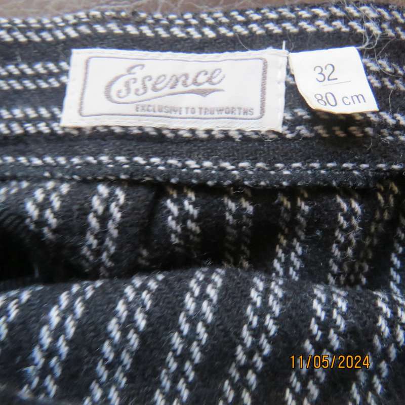 Warm woolen black/white vertical stripe pencil skirt size 30 by ESSENCE. Pleat/zip at back.As new