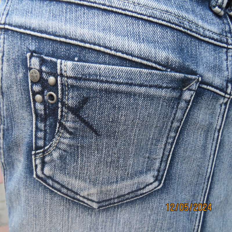 Make a statement in this blue denim jean paneled bodycon skirt.Size 36 by RED. As new cond.