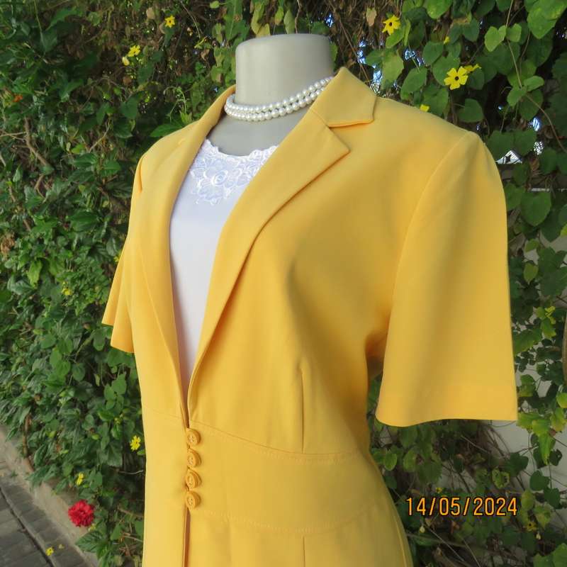 High quality short sleeve canary yellow heavy stretch cotton top/jacket. MILADYS size 36. Brand new