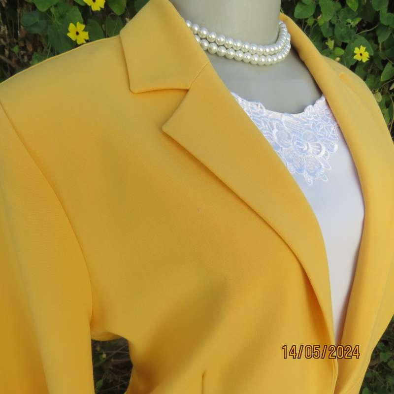 High quality short sleeve canary yellow heavy stretch cotton top/jacket. MILADYS size 36. Brand new