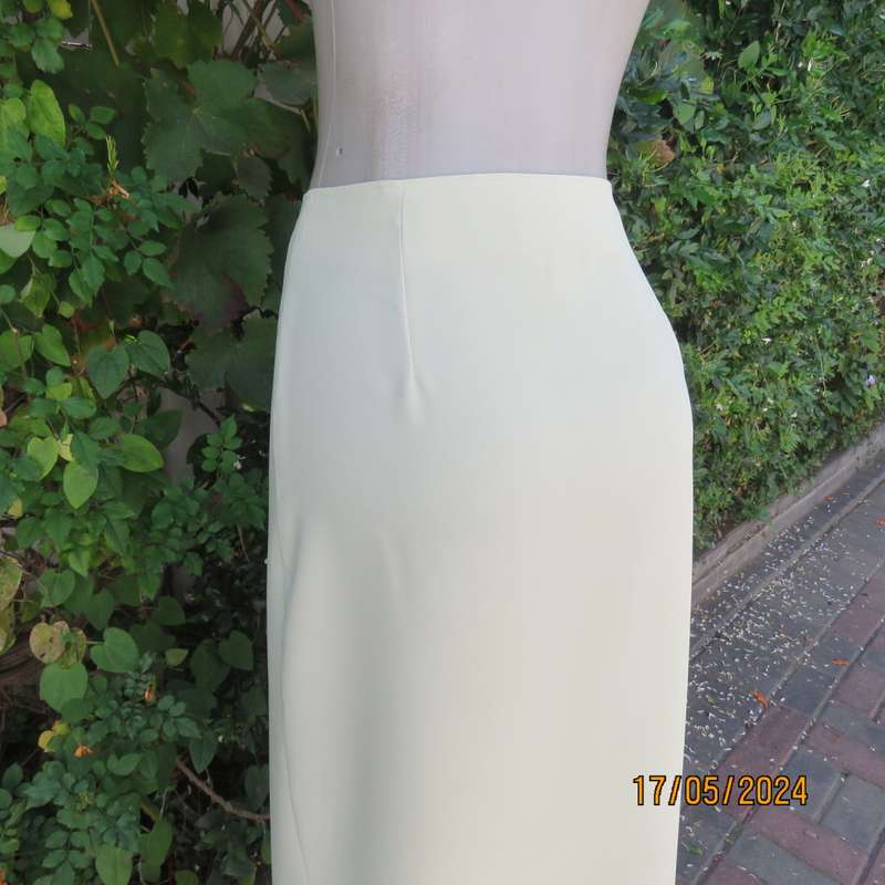 Pretty light lime polyester fold over ankle length skirt. Size 40 By DESIGN. Can adjust buttons.