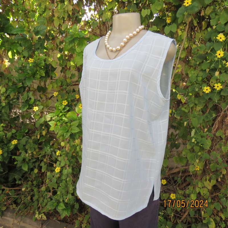 Sky blue sleeveless cami/top. Stunning embossed check poly fabric. Size 40. Slits As new