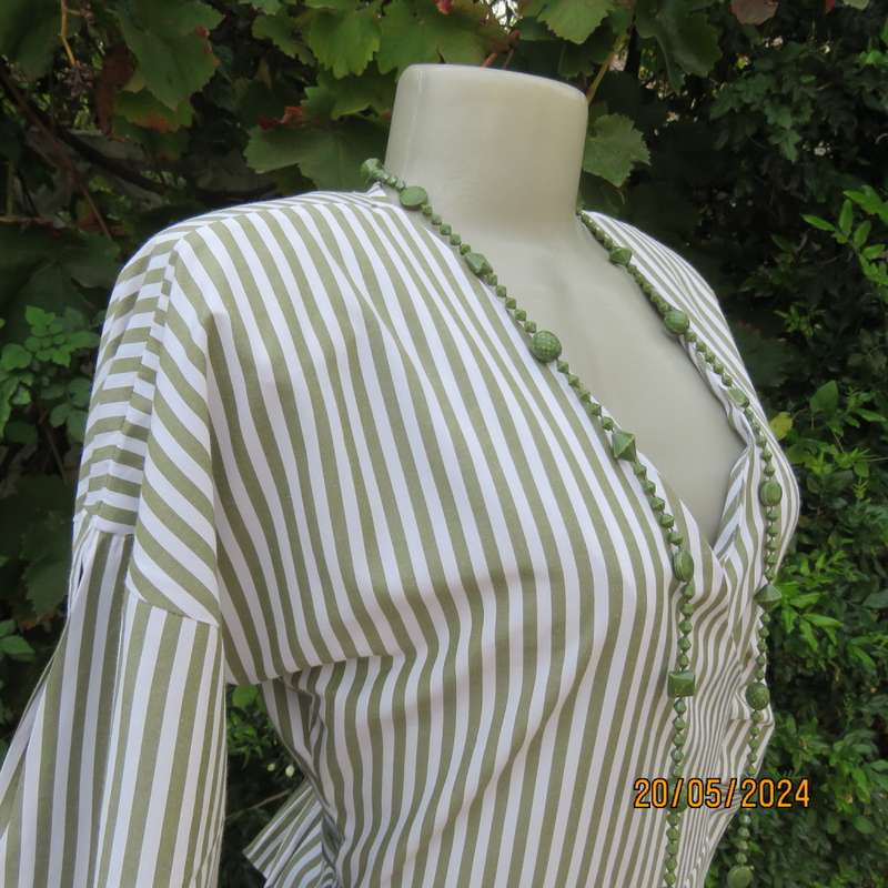 Look at me fold over V neck polycotton peplum style top. White/olive stripes. Unique sleeves.Size 34
